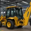 A yellow XCMG XC870K backhoe loader showcased in a factory, representing the multi-tool versatility for urban utility and infrastructure construction.